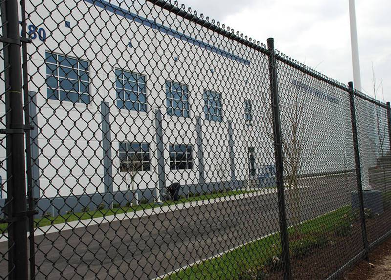 Plastic coated chain link fence features and applications